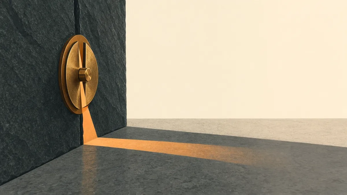 Illustration: brass iris valve in a dark wall, opened to an amber slit, shadow half in light